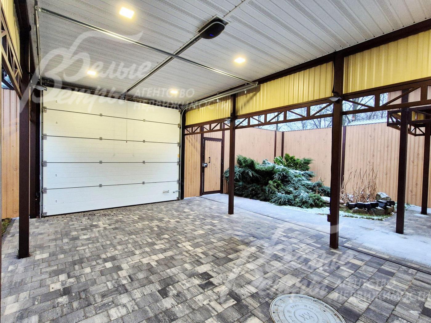 Навес для авто с автоматическими воротами